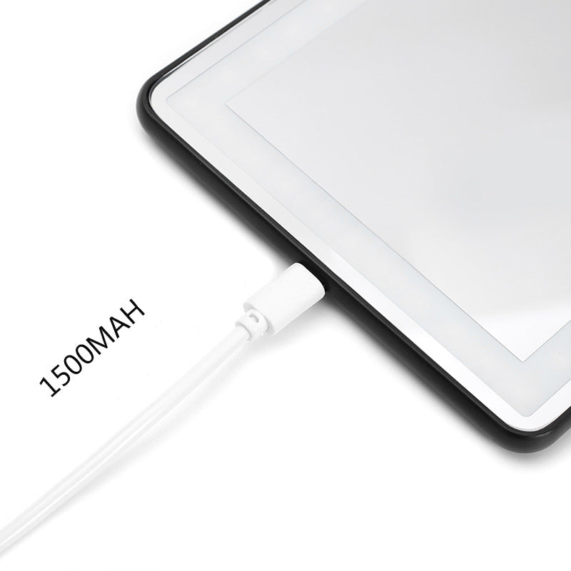 Car LED vanity mirror with a charging cable on a white background, displaying battery information.