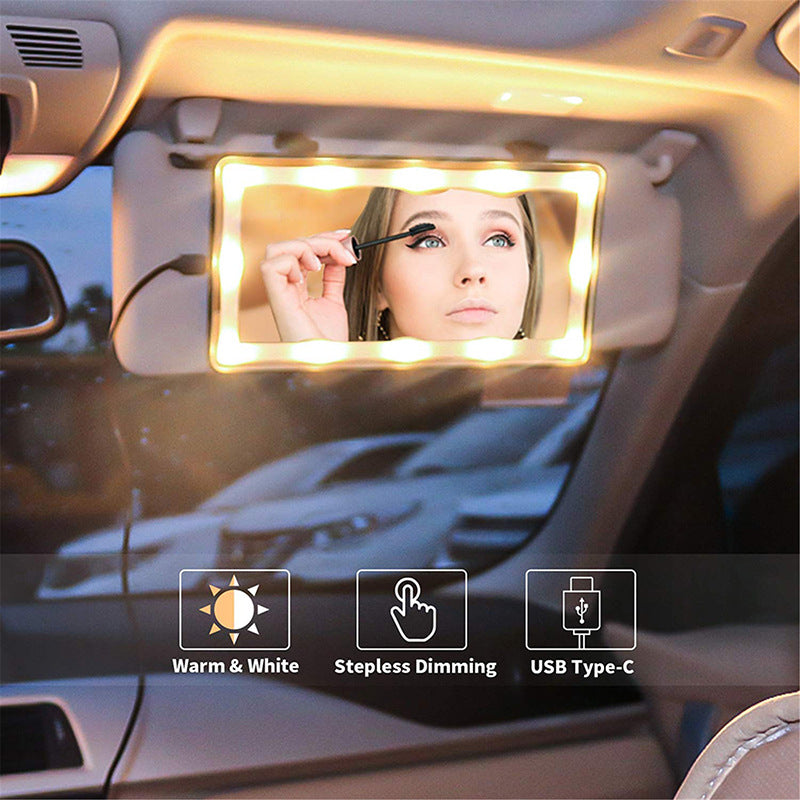 Car mirror with LED light, showing a woman applying makeup, with icons indicating warm white light, stepless dimming, and USB Type-C connection.