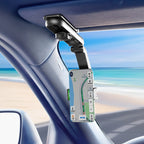 Car dashboard with a navigation device and sunshade.