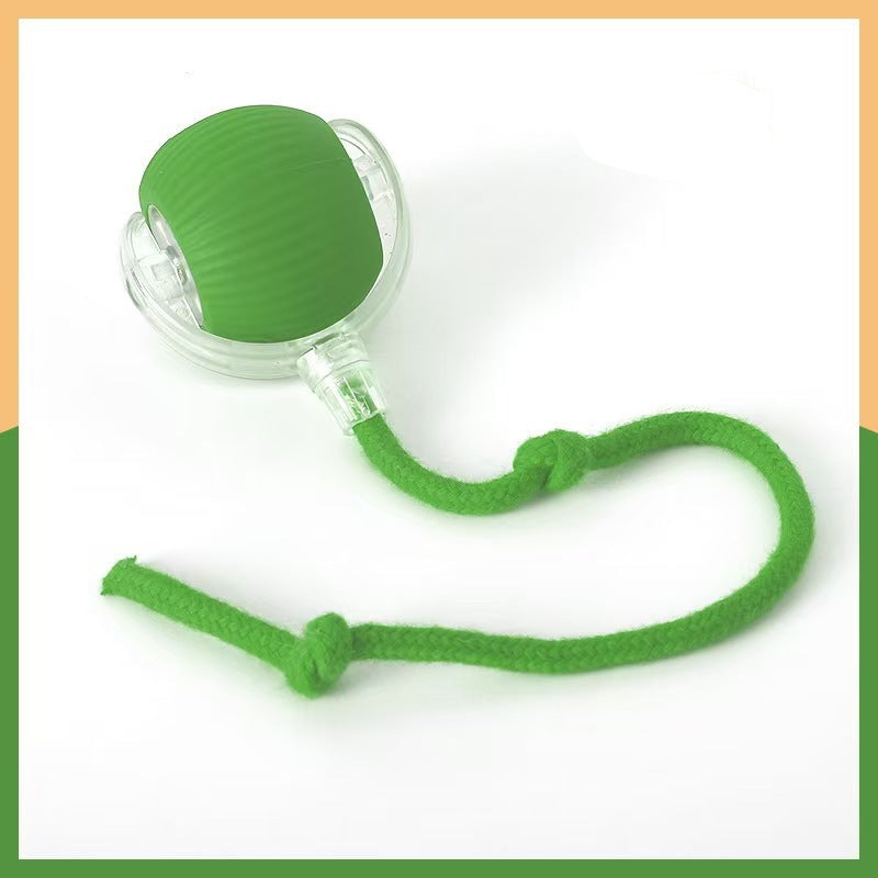 Green silicone ball with a rope on a white background